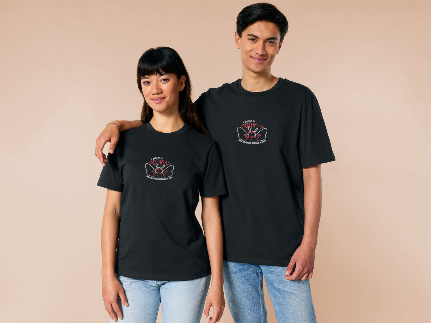 Embroidered black t-shirt with a cute chibi cryptid design of Mothman with the text I believe in Mothman (and Mothman believes in me!)